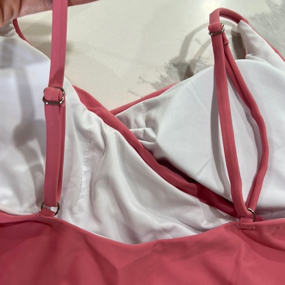 Adorable new never worn pink cut out one piece swimsuit. - Picture 9 of 9
